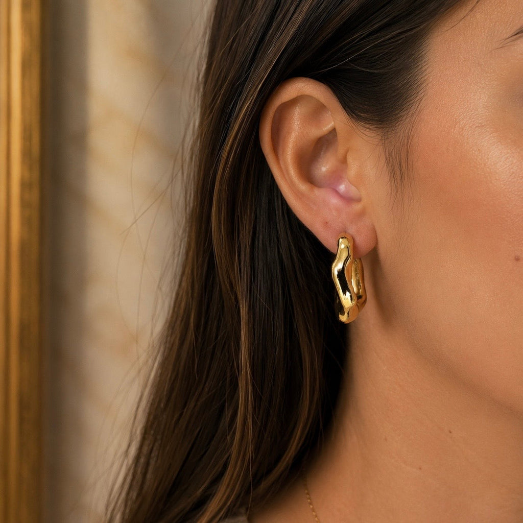 Aretes Aura